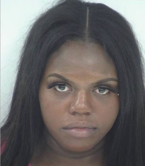 Oninda Romelus mugshot from 2022 arrest in Fayette County, Georgia