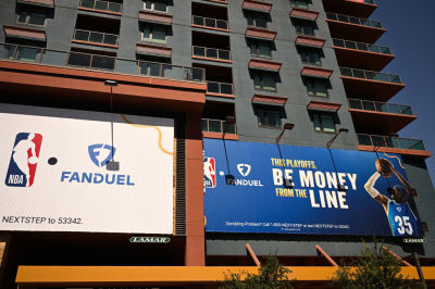 NBA and FanDuel online sports betting signage is displayed on the side of a building in Phoenix, Arizona, on June 5, 2024.