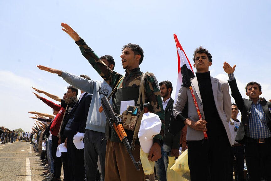 Huthi supporters and university students shout anti-Israeli slogans, calling for an end to the war in Gaza, during a demonstration in Sanaa on August 6, 2025. (Photo by Mohammed HUWAIS / AFP) (Photo by MOHAMMED HUWAIS/AFP via Getty Images)