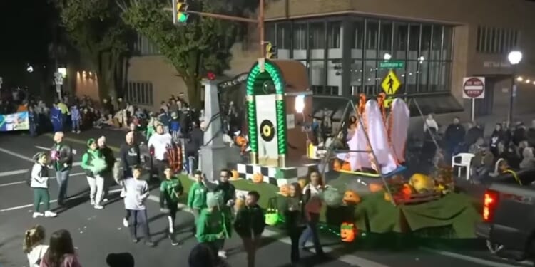 Man charged with threatening Catholic school over Holocaust float