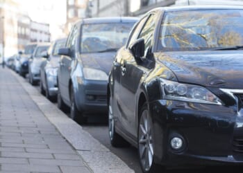 Neighbour row erupts after loved up couple leave bizarre note on homeowner's car 'not to park between us'