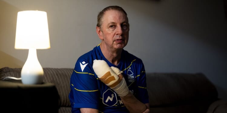 Huntingdon train attack hero receives standing ovation amid return to Nottingham Forest's City Ground