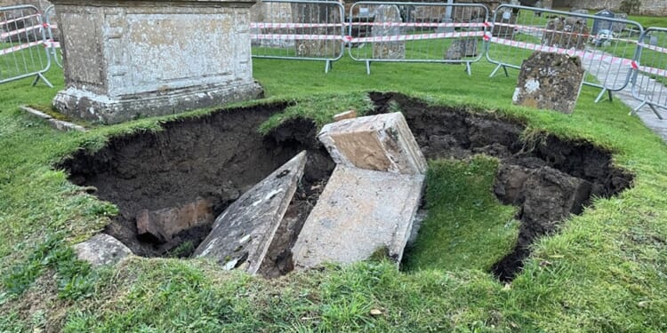 Tomb collapse reveals underground crypt in Somerset churchyard