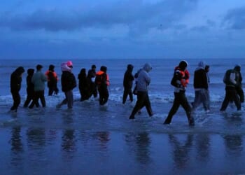 Britons' social media pages scoured for 'anti-migrant posts' by civil servants