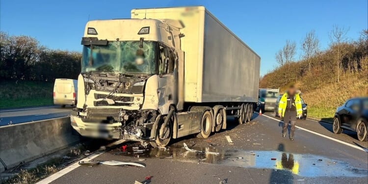 Drivers face chaos after horror crash between two lorries causes massive diesel spill