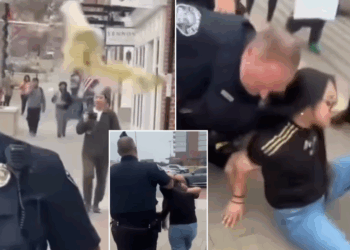 Teenage yob handed instant justice after hurling drink at police officer at Charlotte demonstration