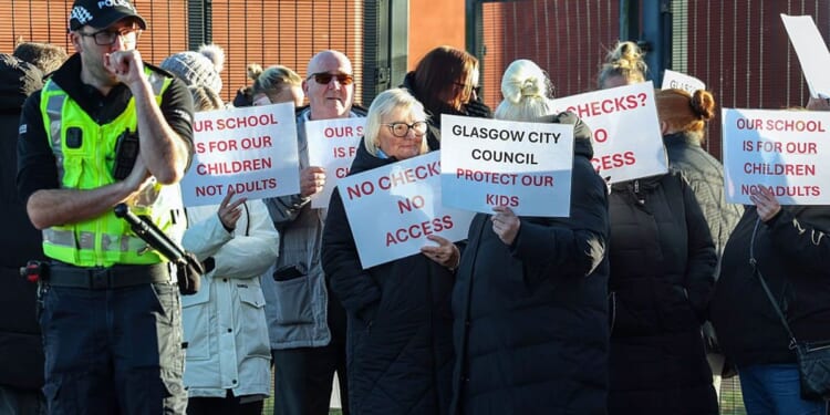 Migrants trying to learn English at primary school face 'protect our kids' protest