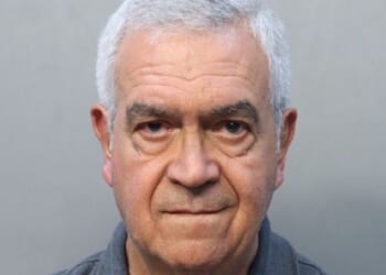 Catholic priest arrested for assault put on leave by archdiocese