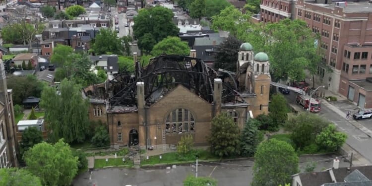 Fire at historic Canadian church investigated as arson attack