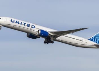 Heathrow flight forced to divert and land after laptop slips down side of seat