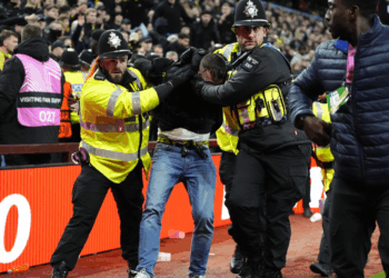 Police officers punched in face at game as fan violence erupts