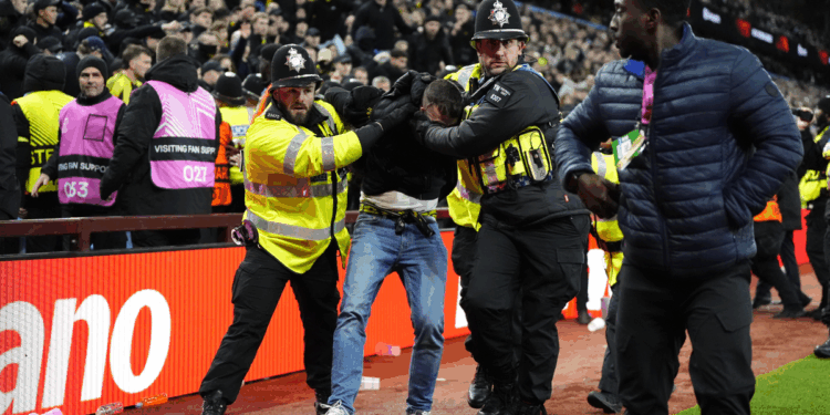 Police officers punched in face at game as fan violence erupts