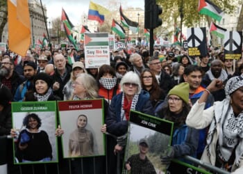 Police make dozens of arrests at protests across Britain