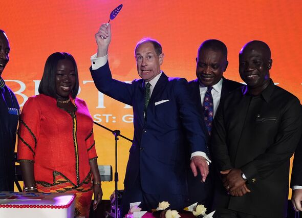 Prince Edward cutting a cake in Ghana