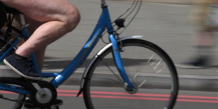 Essex news: Nude charity cyclist who was attacked on bicycle by binman breaks silence: 'I'm not a pervert!