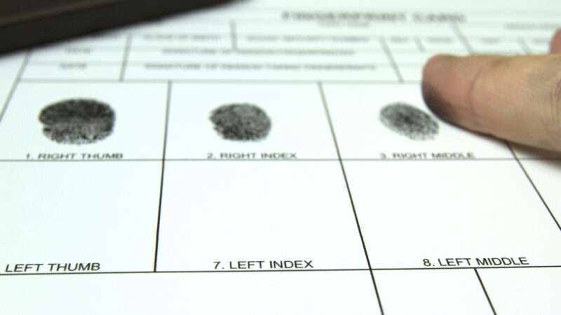 Fingerprints being taken on ink and paper | Karen Foley | Dreamstime.com