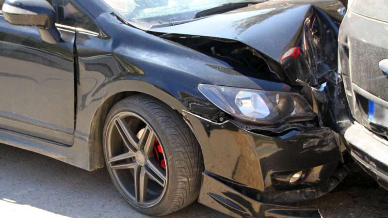 A crashed sedan. | Eladora | Dreamstime.com