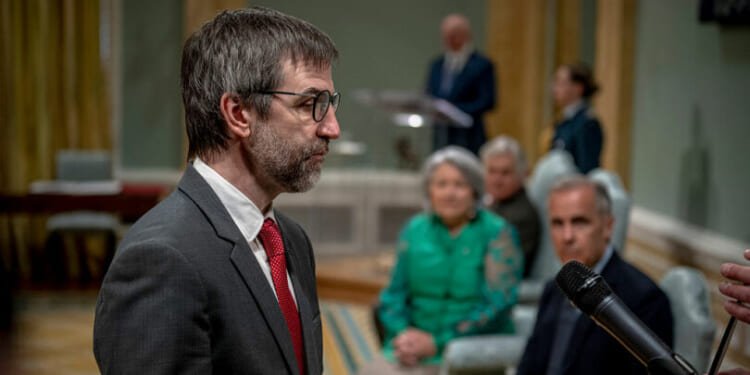 Eco-radical Canadian Cabinet minister resigns after oil deal approved