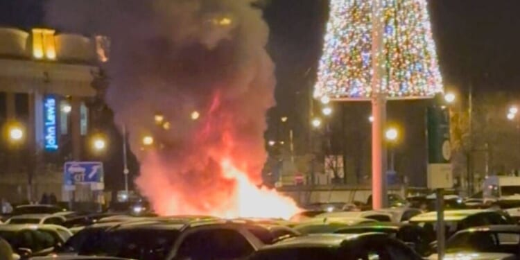 Horror fire rips through multiple vehicles in Trafford Centre car park | UK | News