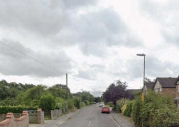 Police swarm street in sleepy village as bodies of two pensioners found | UK | News