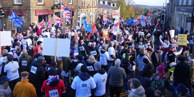 Protesters march against plan to house asylum seekers in barracks | UK | News