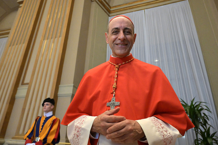 Newly elevated cardinal, Argentinian prelate Victor Manuel Fernandez, attends a courtesy visit of relatives following a consistory for the creation of 21 new cardinals in The Vatican on September 30, 2023. Pope Francis elevates 21 clergymen from all corners of the world to the rank of cardinal -- most of whom may one day cast ballots to elect his successor.