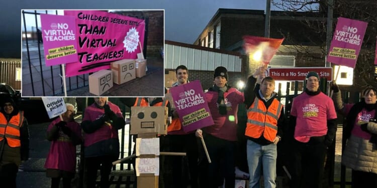 Teaching staff walk out over school's decision to hire 'virtual teacher' who lives more than 300 miles away