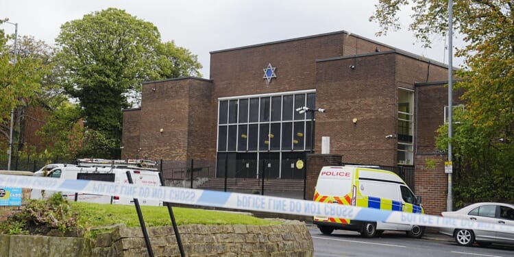 Man charged with four terrorism offences for allegedly assisting attacker