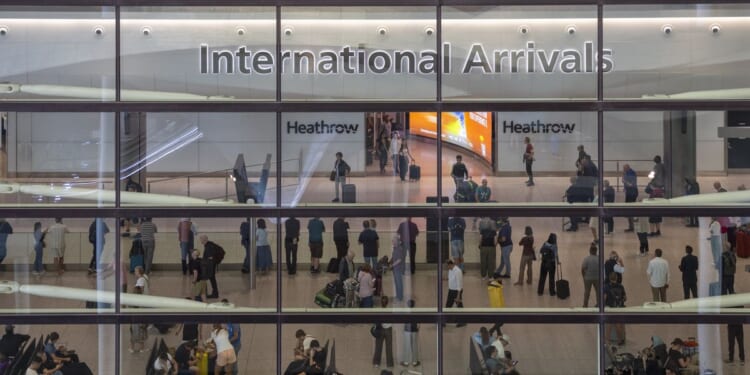 Heathrow Airport terminal 'locked down' as armed police rush to scene