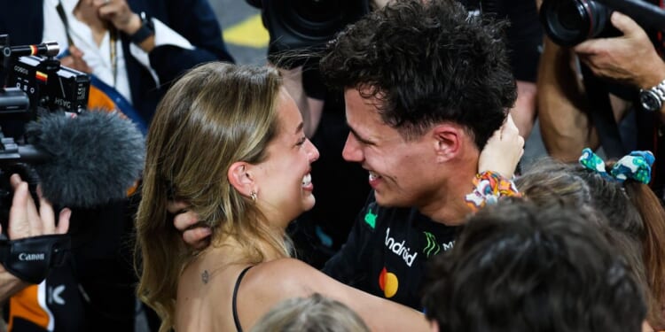Lando Norris kisses model girlfriend Magui Corceiro and embraces overjoyed mum as British driver celebrates