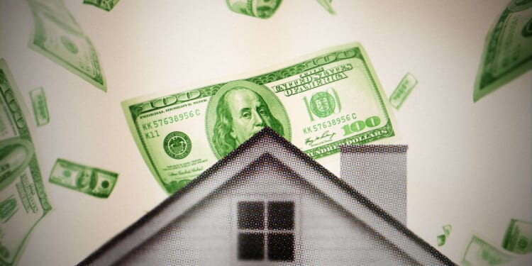 A house is seen with $100 bills falling behind it