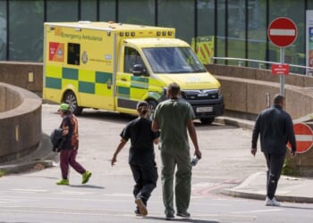 Superflu LIVE: NHS on the brink as people urged to wear masks over flu 'tidal wave'