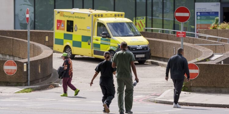 Superflu LIVE: NHS on the brink as people urged to wear masks over flu 'tidal wave'