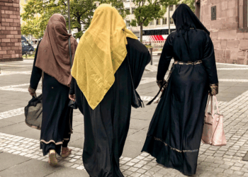 Country joins France in banning headscarves in schools in 'clear commitment to gender equality'