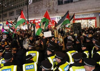 Pro-Palestine protesters arrested after calling for 'intifada' just hours after Met Police announced plans to detain anyone chanting antisemitic slogans
