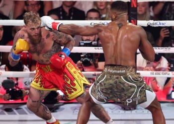 Anthony Joshua bounces back from slow start to beat Jake Paul as boxing fans left furious