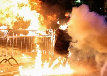 Albanian protesters hurl petrol bombs in country's capital after deputy PM indicted over corruption