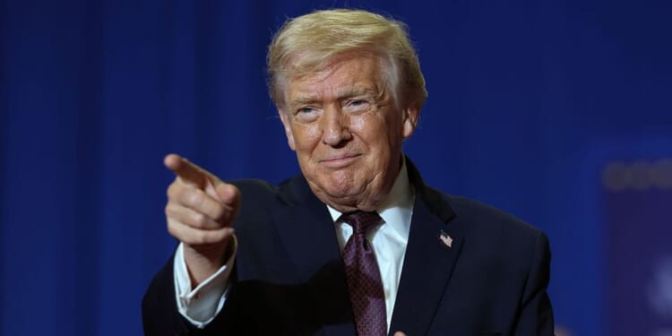 US economy grows at fastest pace in two years as Donald Trump outperforms economists' predictions