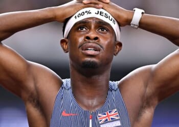 British sprinter who broke athletics rules with '100 per cent Jesus' headband opens up on power of Christianity when he competes