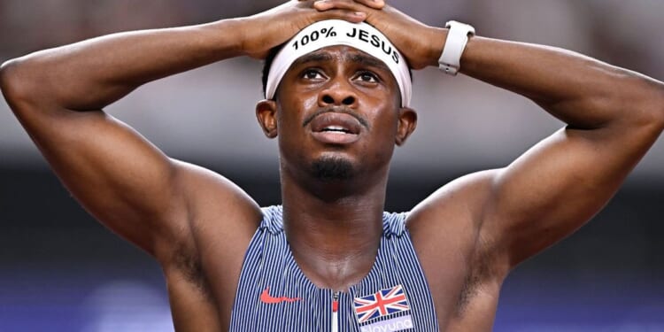 British sprinter who broke athletics rules with '100 per cent Jesus' headband opens up on power of Christianity when he competes