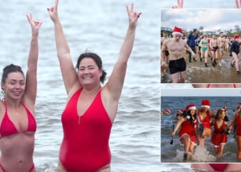 Brave Britons dive into sea before temperatures plunge below freezing