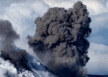 Italy: Astounding moment snow-capped Mount Etna spews molten lava while plumes of black ash engulf Sicily