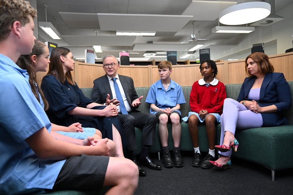 Anthony Albanese visits a school shortly after his social media ban came into force