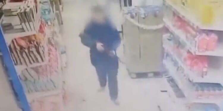 Chilling moment gunman opens fire with AK-47 in supermarket as shoppers flee in panic | World | News