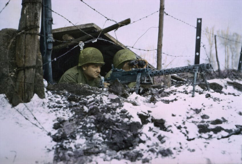 Airborne Infantrymen, .30-caliber Machine Gun, Ardennes-Alsace Campaign, Battle of the Bulge, 1945. (Photo by: History Archive/Universal Images Group via Getty Images)