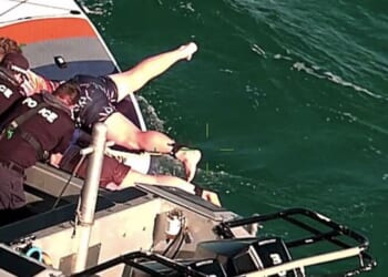 Dramatic Christmas rescue as woman and her stepson saved after drifting 6 miles at sea | World | News