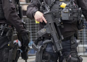 Driver shot dead by police after 'fleeing two-car crash brandishing handgun'