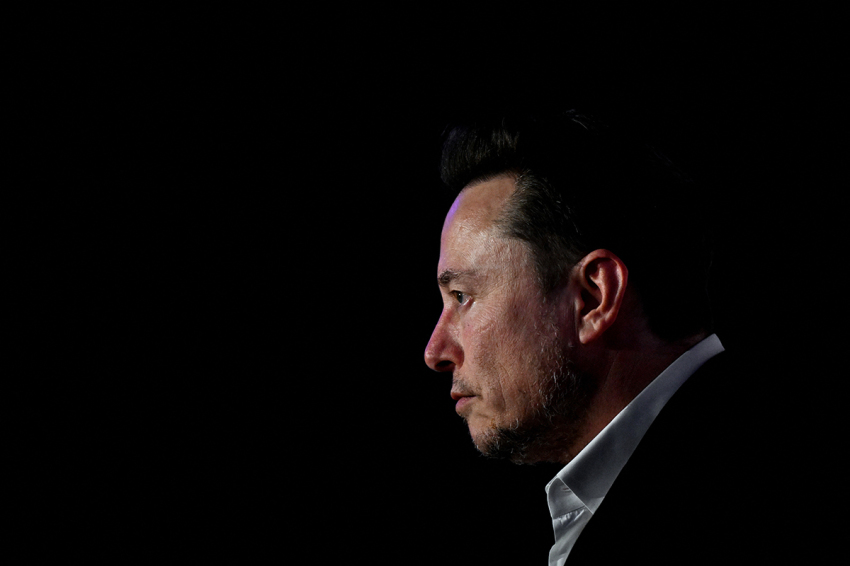 X CEO Elon Musk attends a symposium on 