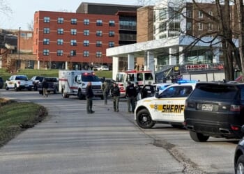 Father charged with murder after attack at son's university | World | News