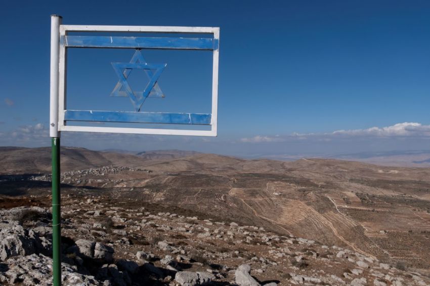 The Israeli flag made from steel placed at Matan Lookout overlooking the hills of Samaria also known as Nablus Mountains located on the Gidonim ridge (a hilltop on which several Jewish settlements are located), above the Israeli settlement of Itamar in the West Bank.